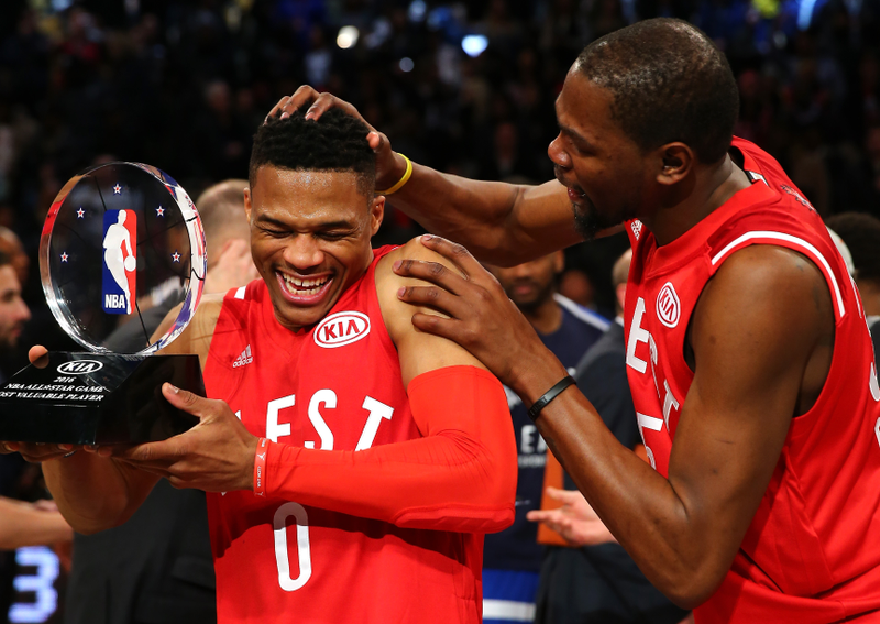 MVP Russell Westbrook of the Oklahoma City Thunder and the NBA’s Western Conference is congratulated by teammate Kevin Durant after defeating the Eastern Conference during the NBA All-Star Game on Feb. 14, 2016, in Toronto.Elsa/Getty Images